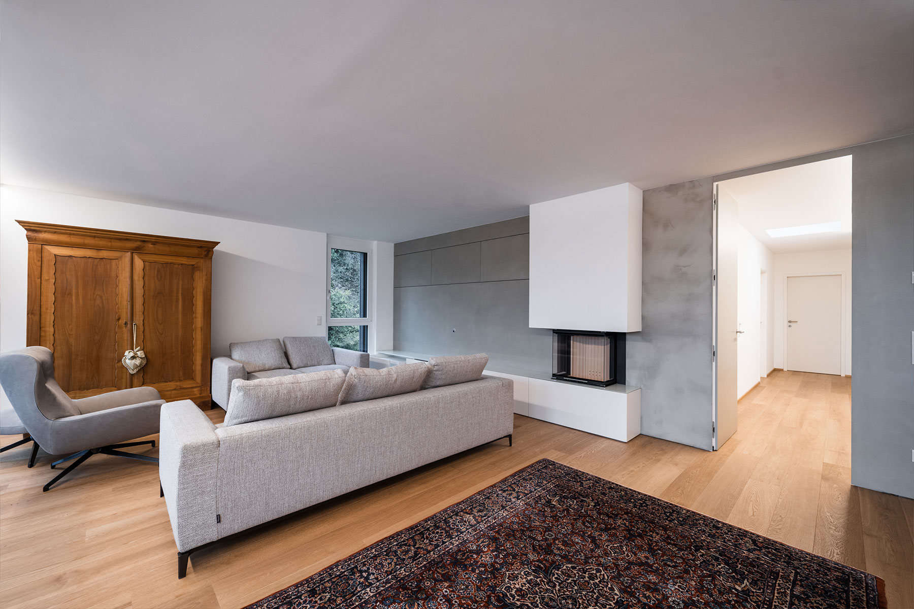 Tischlerei Mähr – Projekt Hilti – Wohnzimmer mit Kamin
